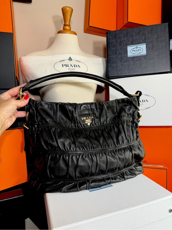 Prada Handbags - Prada 🌟 Black Runched Leather Shoulder Bag with Gold ! Offers always welcome!